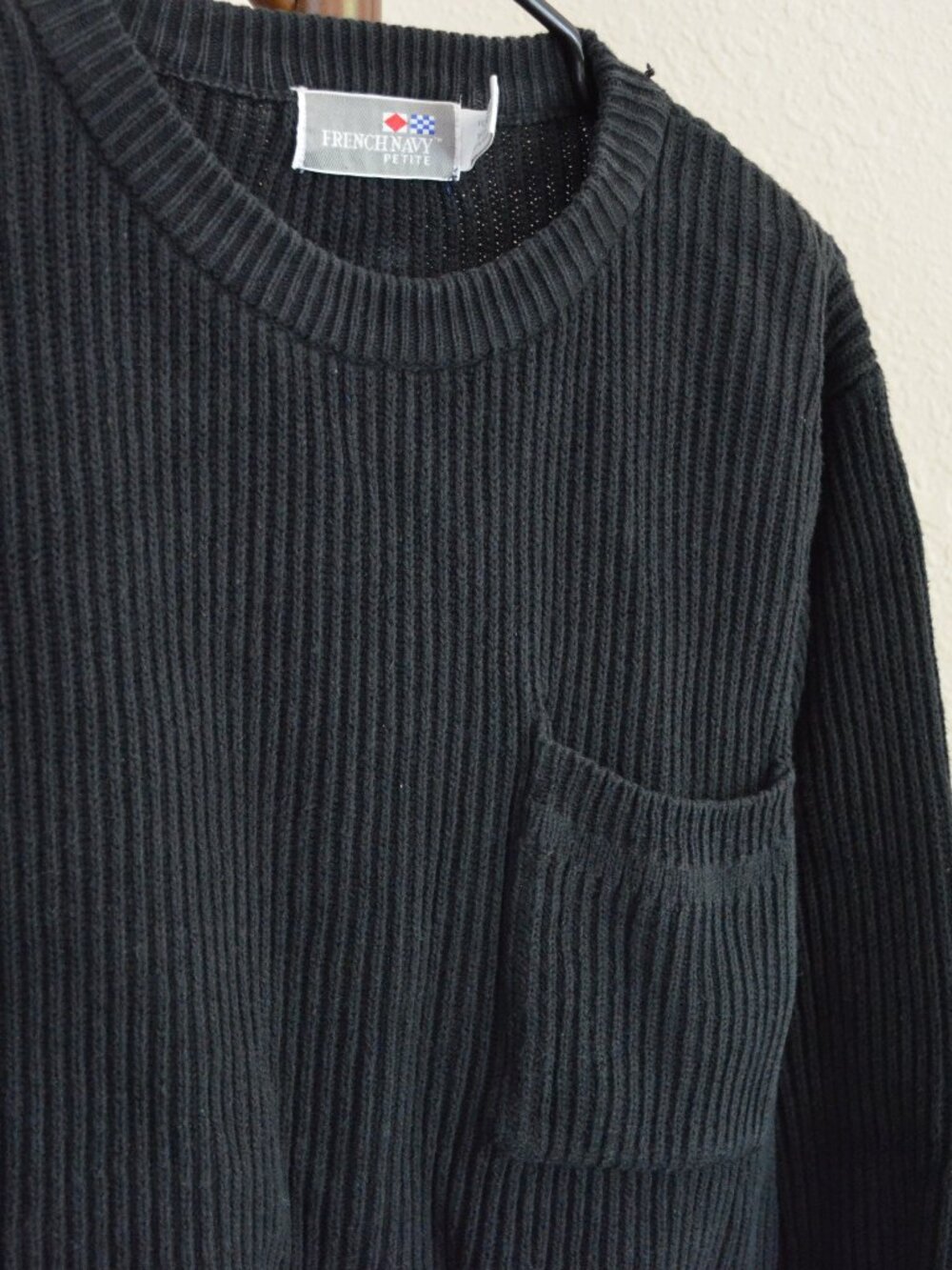 black knit sweater with pocket